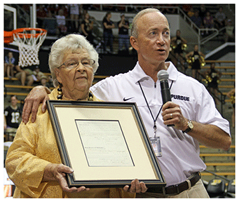 Ruth Martin and Mitch Daniels with John Purdue document 2013