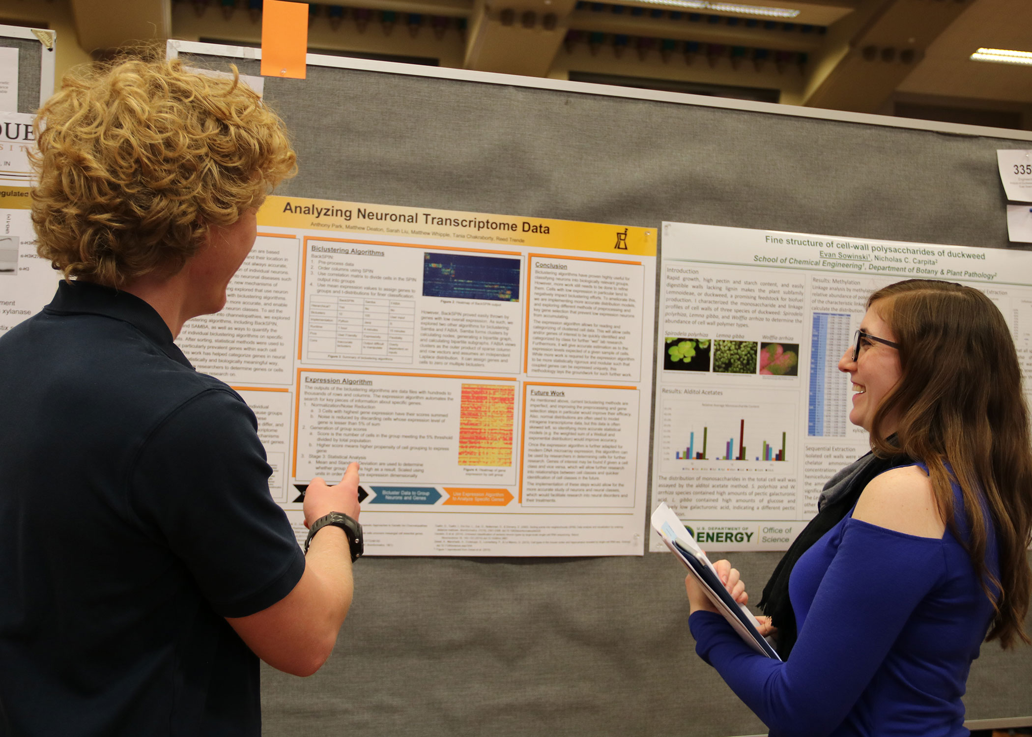 Purdue Libraries Information Literacy Instructional Designer Rachel Fundator (right) is served as one of the judges for the poster symposium/competition in the Office of Undergraduate Research's 2018 Undergraduate Research Conference (April 10). 
