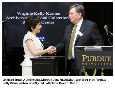 Purdue President Cordova and Libraires Dean Jim Mullins in the Archives and Spcial Collections Research Center.