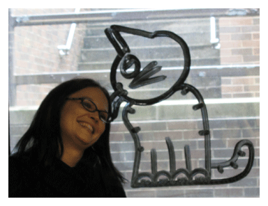 Dawn Stahura and cartoon drwing of Maze the cat by Ryan Bidlack.