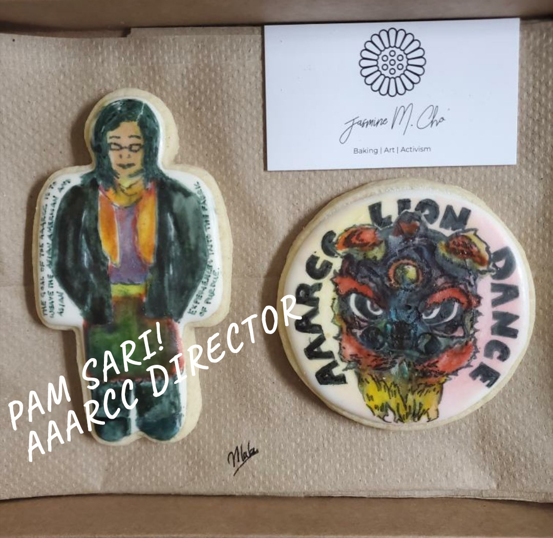 Cookies of Role Models example image. There are two cookies depicting Pam Sari, AAARCC Director, and the AAARCC Lion Dance.