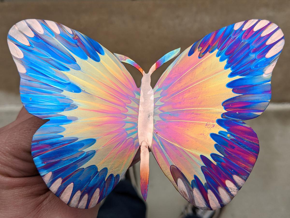 Iridescent metal butterfly.